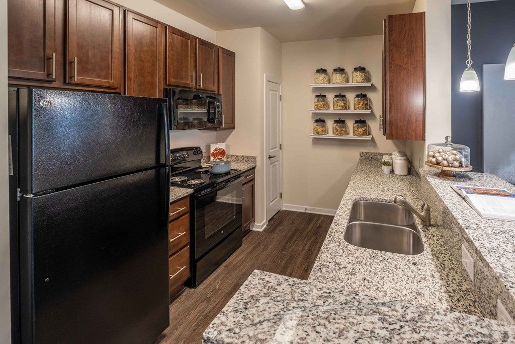 Granite Counter Tops In Kitchen at Abberly CenterPointe Apartment Homes by HHHunt, Midlothian, VA, 23114
