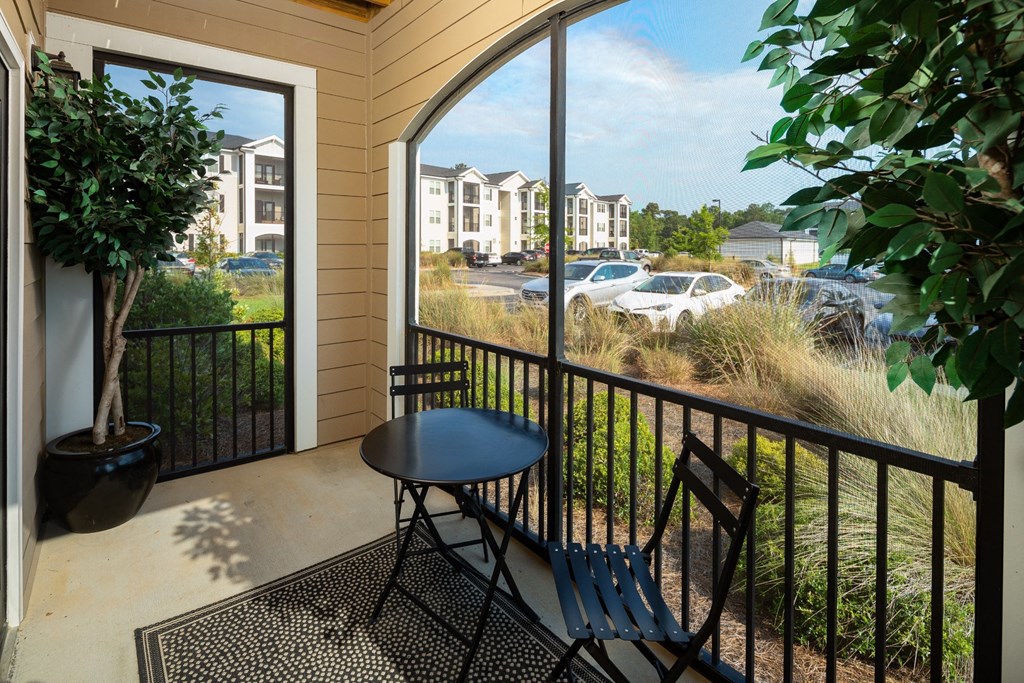 Private Balcony With Seating at Abberly Crossing Apartment Homes by HHHunt, Ladson, 29456