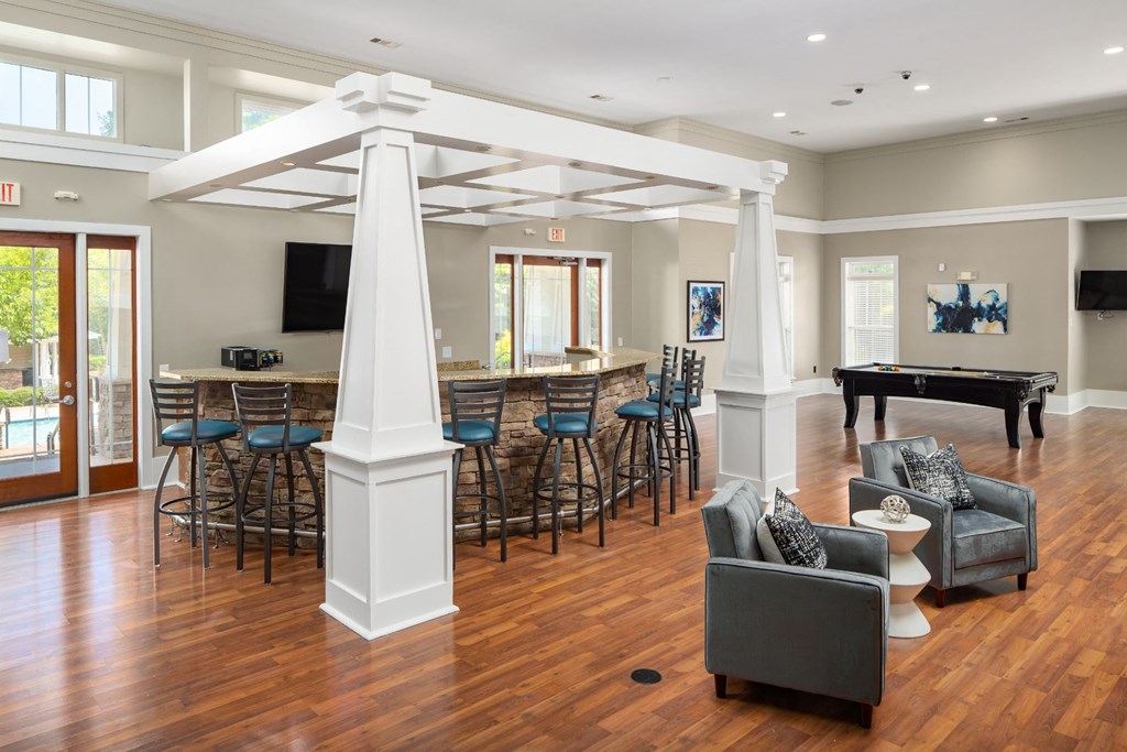 Clubhouse Kitchen Breakfast Bar with Stools at Abberly Place at White Oak Crossing Apartments, HHHunt Corporation, Garner, 27529