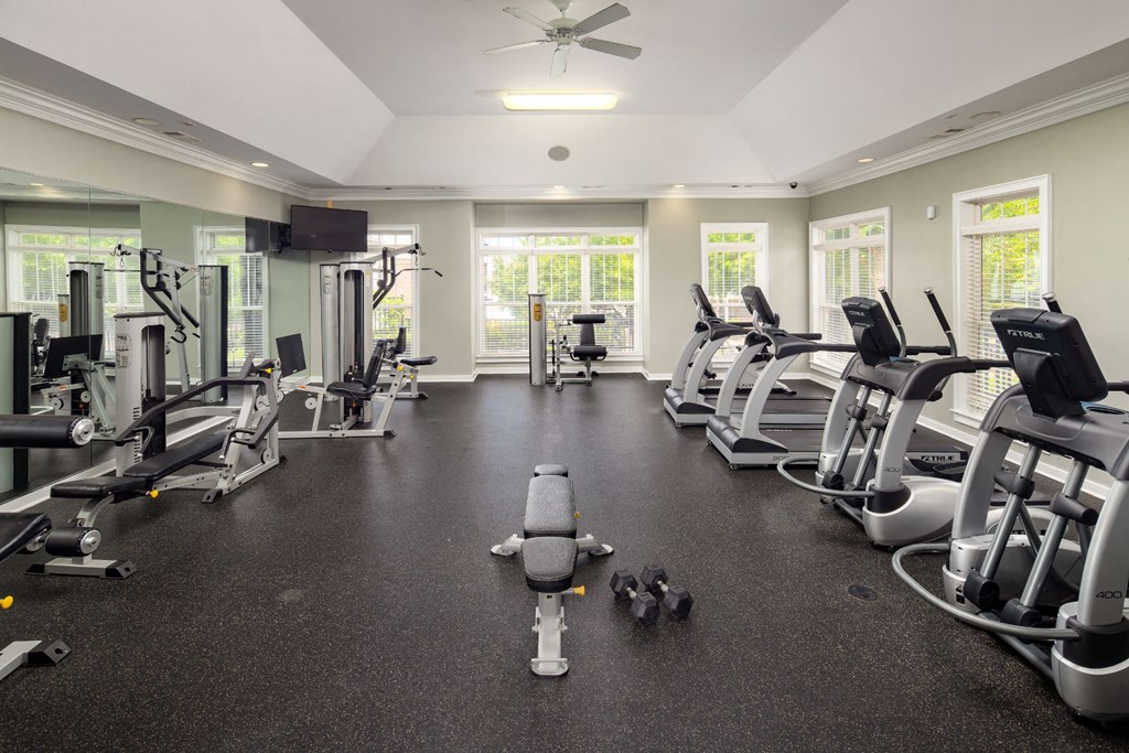Cardio Machines In Gym at Abberly Place at White Oak Crossing Apartments, HHHunt Corporation, Garner