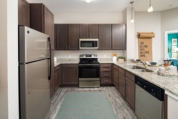 Refrigerator And Kitchen Appliances Refrigerator And Kitchen Appliances at Abberly Solaire Apartment Homes, Garner, NC, 27529 - Photo Gallery 2