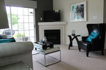 Living Room With Standard Fireplace Living Room With Standard Fireplace at Abberly Twin Hickory Apartment Homes by HHHunt, Glen Allen, Virginia - Photo Gallery 3