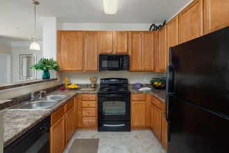Efficient Appliances In Kitchen Efficient Appliances In Kitchen at Abberly Village Apartment Homes by HHHunt, West Columbia, SC, 29169