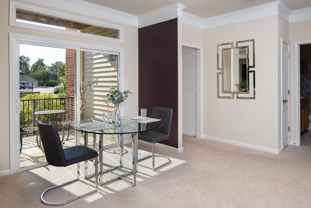 Comfy Chairs With Eating Table at Abberly Village Apartment Homes by HHHunt, West Columbia, SC