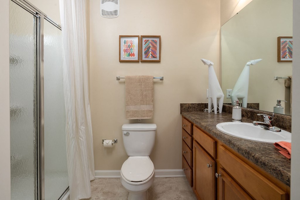 Renovated Bathrooms With Quartz Counters at Abberly Village Apartment Homes by HHHunt, South Carolina