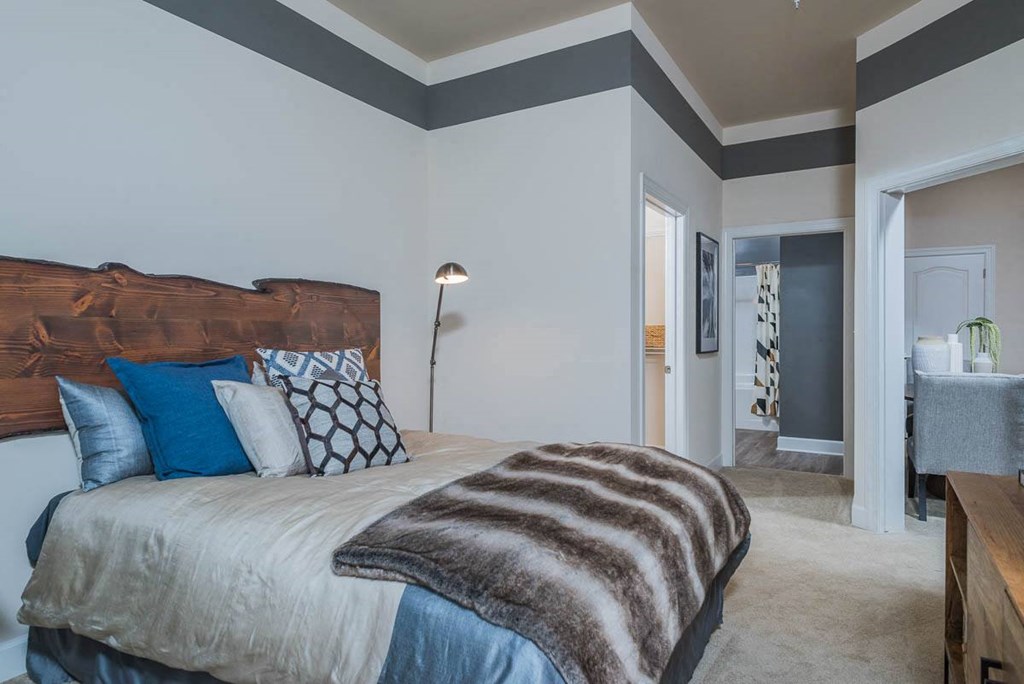 bedroom with cozy bed at Abberly Waterstone Apartment Homes, Virginia, 22554