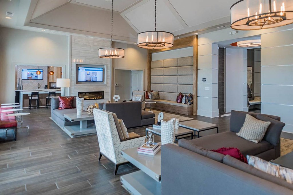 Warm Fireplace Sitting at Abberly Waterstone Apartment Homes by HHHunt, Virginia