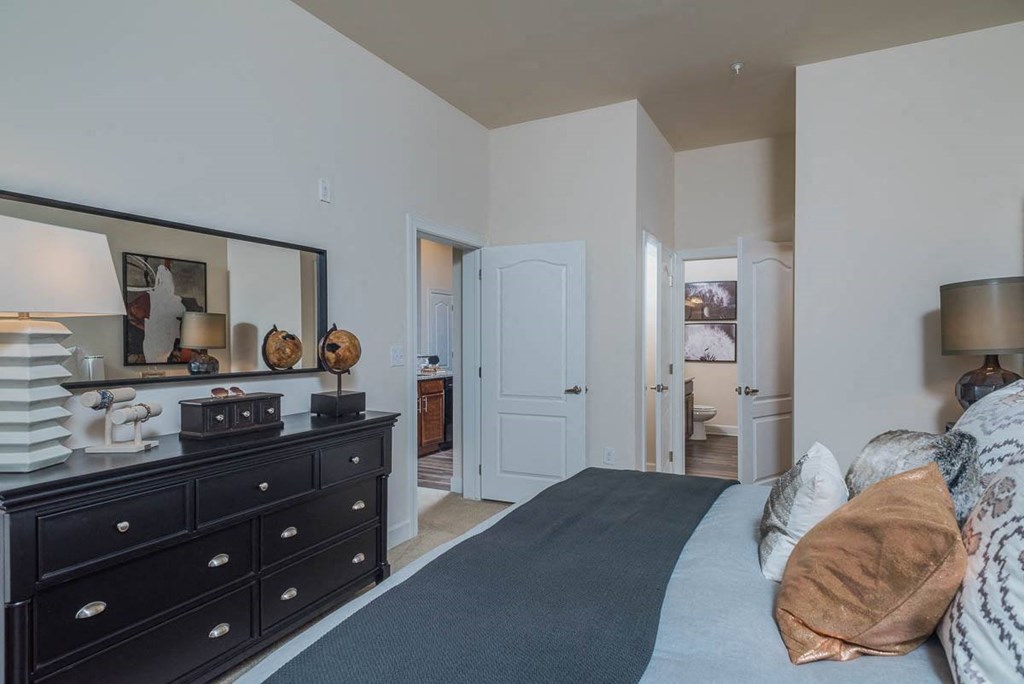 Bedroom with Dresser at Abberly Waterstone Apartment Homes by HHHunt, Stafford