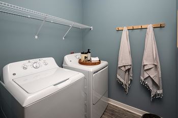 a washer and dryer in the laundry room