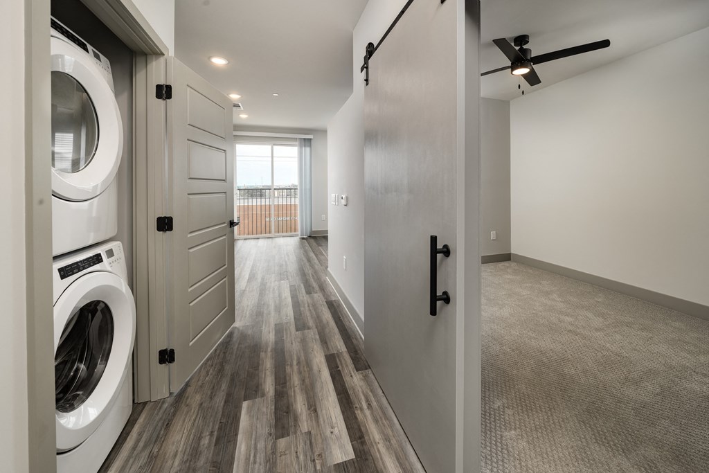 an open laundry room with a washer and dryerat Abberly Foundry Apartment Homes, Nashville, TN, 37206