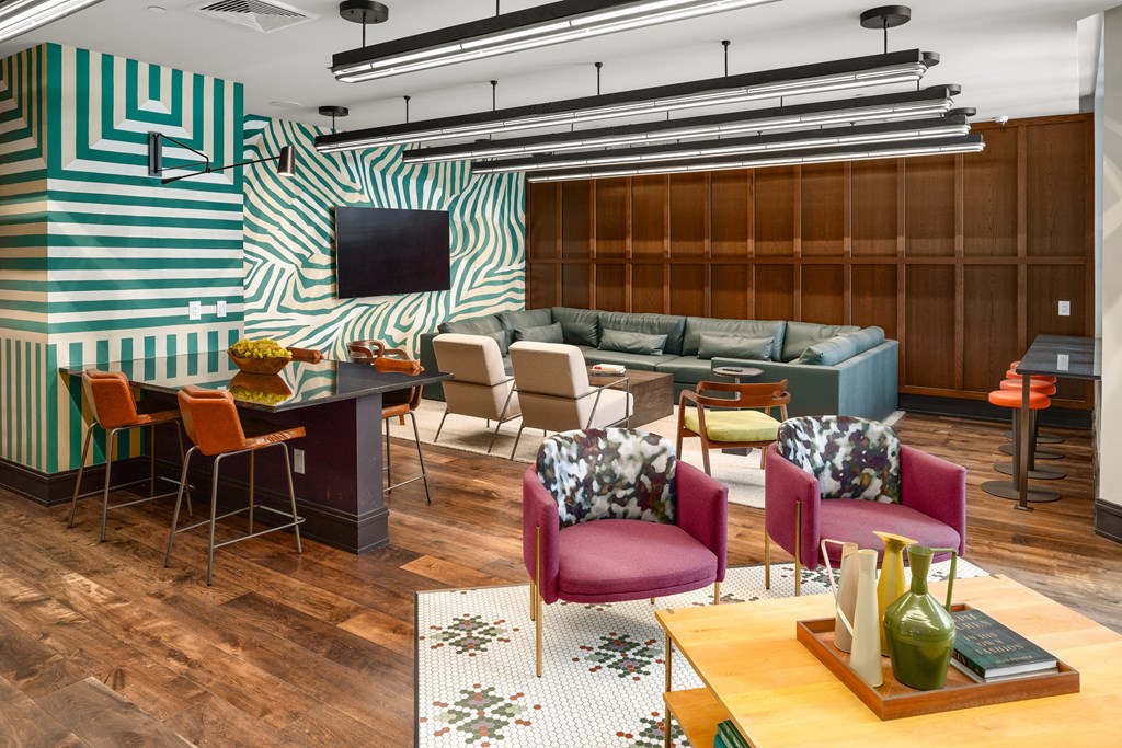 a room filled with furniture and a large window at Abberly Foundry Apartment Homes, Nashville, 37203