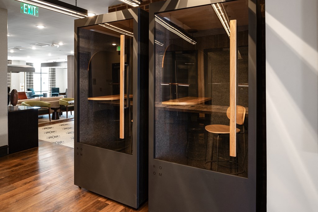 a room filled with furniture and a large window at Abberly Foundry Apartment Homes, Tennessee