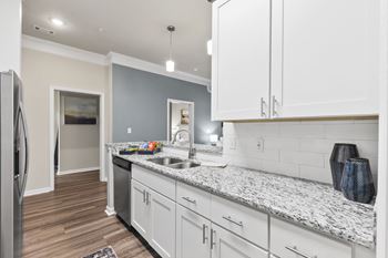  kitchen with white cabinets at Abberly at West Ashley Apartment Homes, Charleston, SC 29414