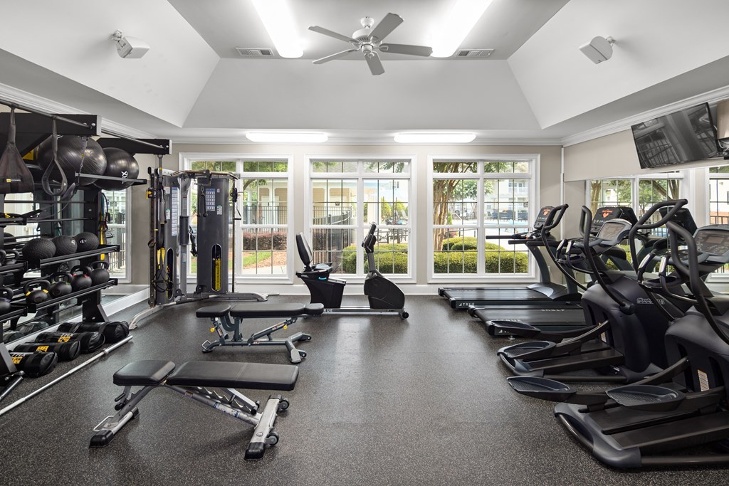 the gym at the enclave at woodbridge apartments in sugar land, tx at Abberly Grove Apartment Homes, Raleigh