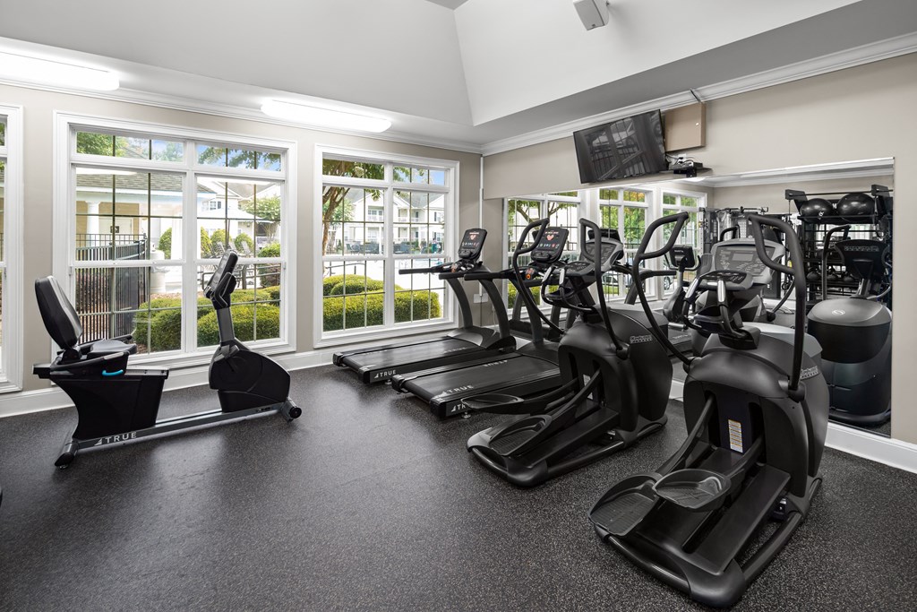 the gym at the enclave at woodbridge apartments in sugar land, tx at Abberly Grove Apartment Homes, North Carolina, 27610