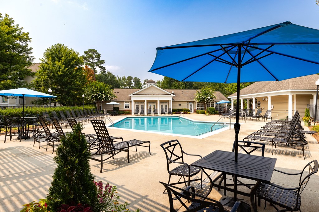 our apartments showcase an outdoor pool at Abberly Grove Apartment Homes, Raleigh, 27610
