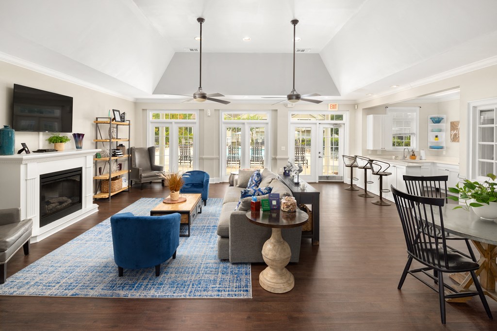 a living room filled with furniture and a fire place at Abberly Grove Apartment Homes, North Carolina