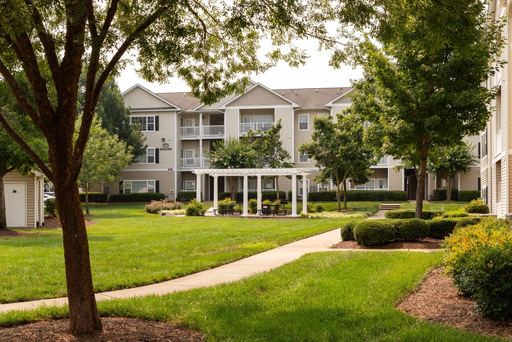 a gazebo sits in front of an apartment building at Abberly Grove Apartment Homes, Raleigh, North Carolina