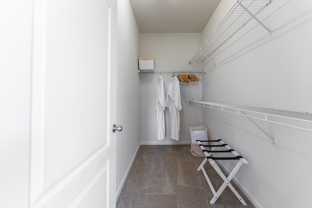 a walk in closet in a 555 waverly unit  at Abberly Crest Apartment Homes, Lexington Park, 20653