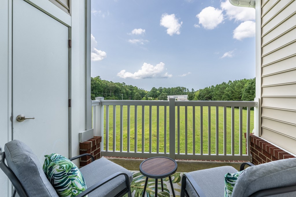 a view of the balcony from the living room at Abberly Crest Apartment Homes, Lexington Park, Maryland