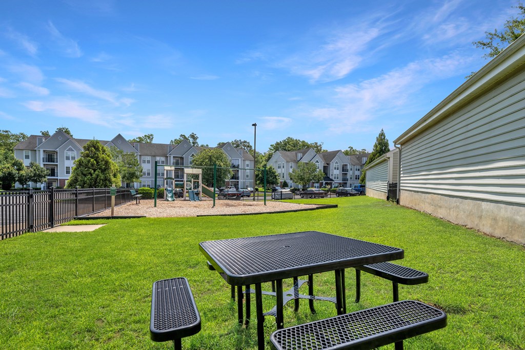 the backyard at the enclave at woodbridge apartments in sugar land, tx at Abberly Crest Apartment Homes, Maryland, 20653