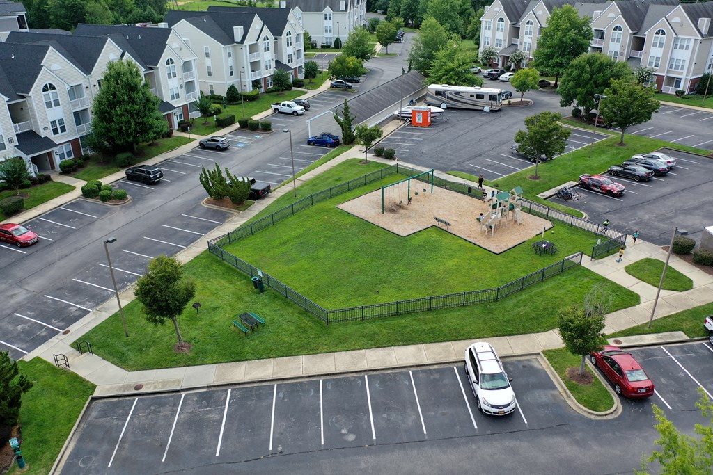 an aerial view of a park with a basketball court at Abberly Crest Apartment Homes, Lexington Park, Maryland