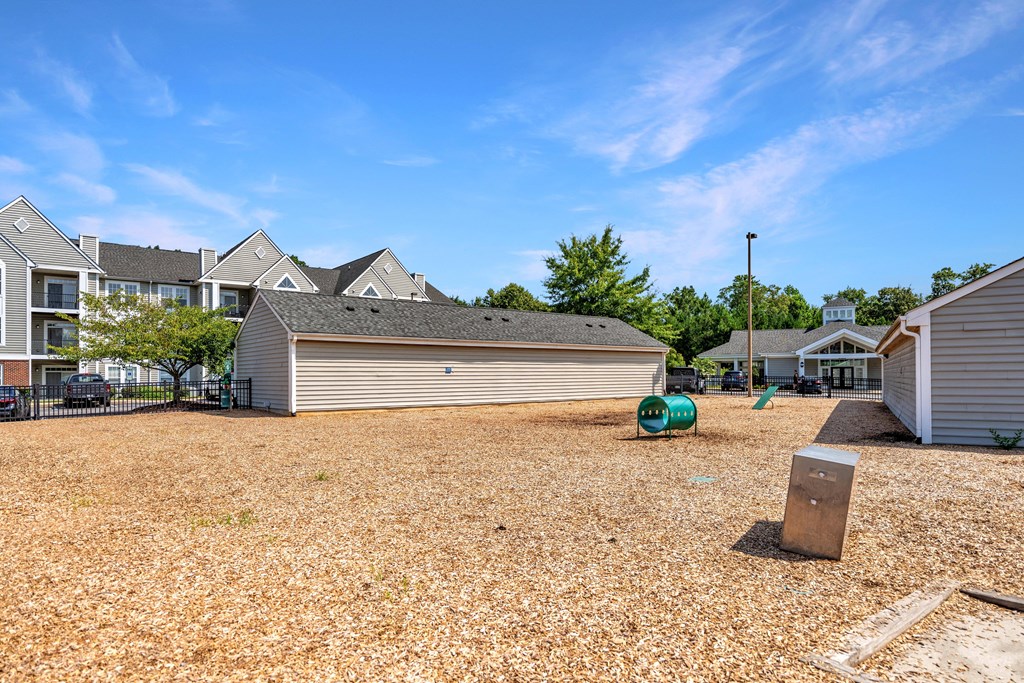 the backyard at the enclave at woodbridge apartments in sugar land, tx  at Abberly Crest Apartment Homes, Lexington Park, 20653