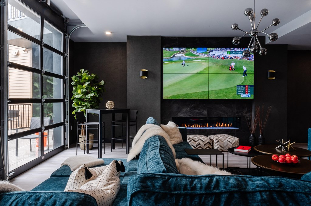 a living room with a couch and a tv