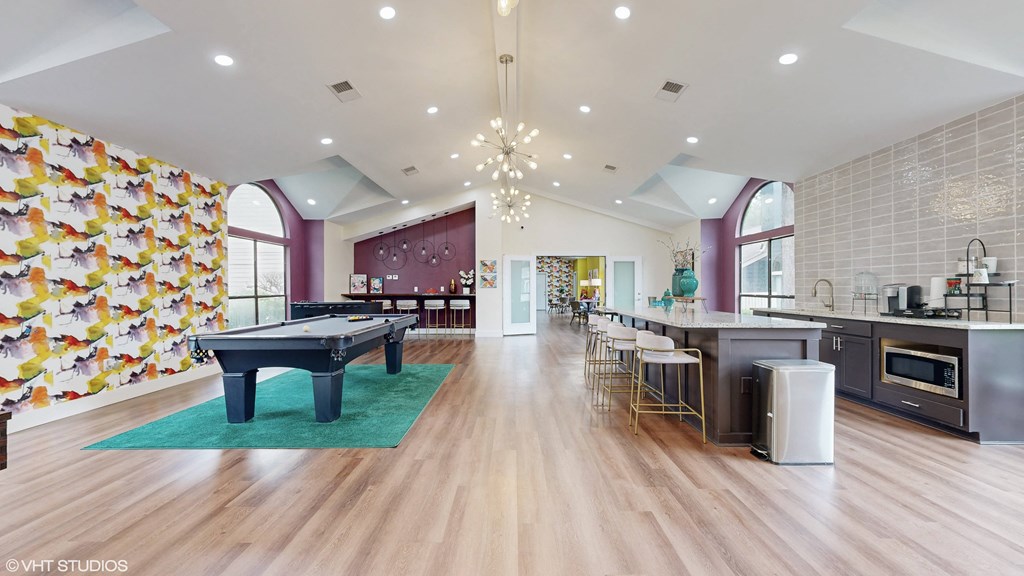 a game room with a pool table and a bar at The Vale Apartments and Townhomes, Cordova, TN