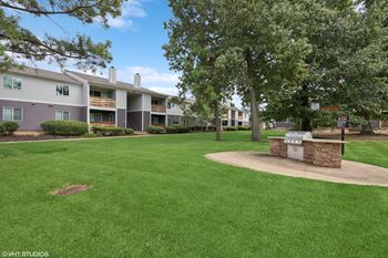 our apartments have a spacious yard with a fire pit