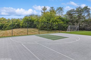 a basketball court in a park with a soccer goal at Runaway Bay Apartments, Columbus, 43204