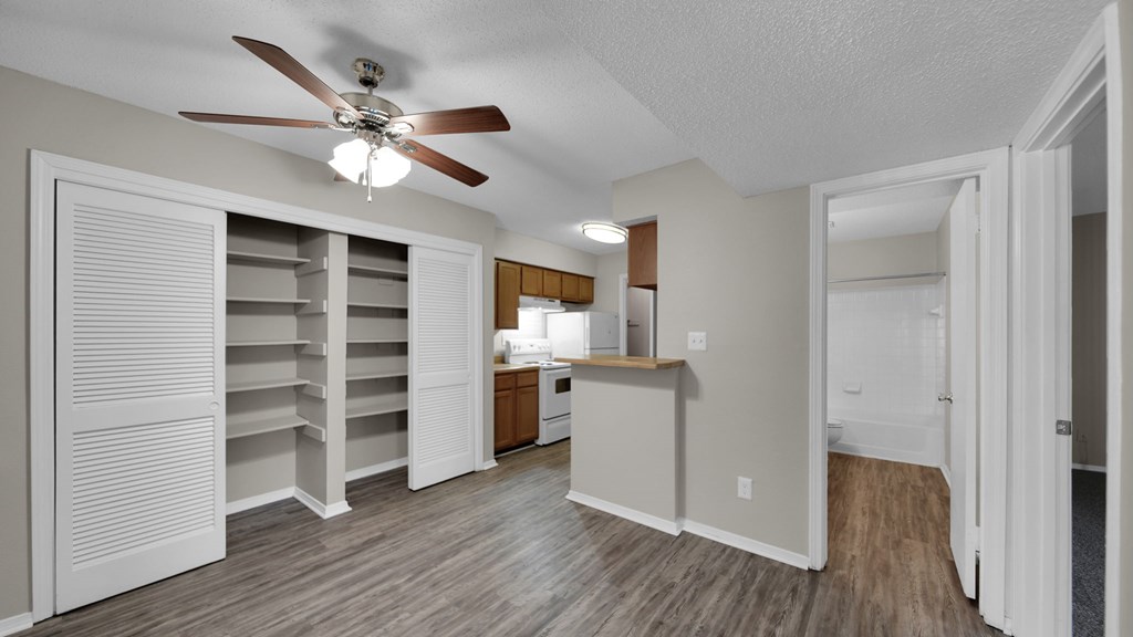 A room with a ceiling fan and a cabinet. at The Local Apartments, Tennessee, 38115