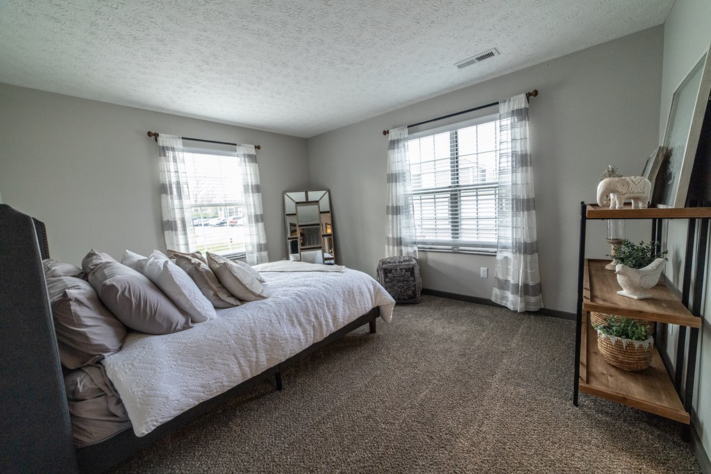 Bedroom With Expansive Windows at Island Club, Columbus