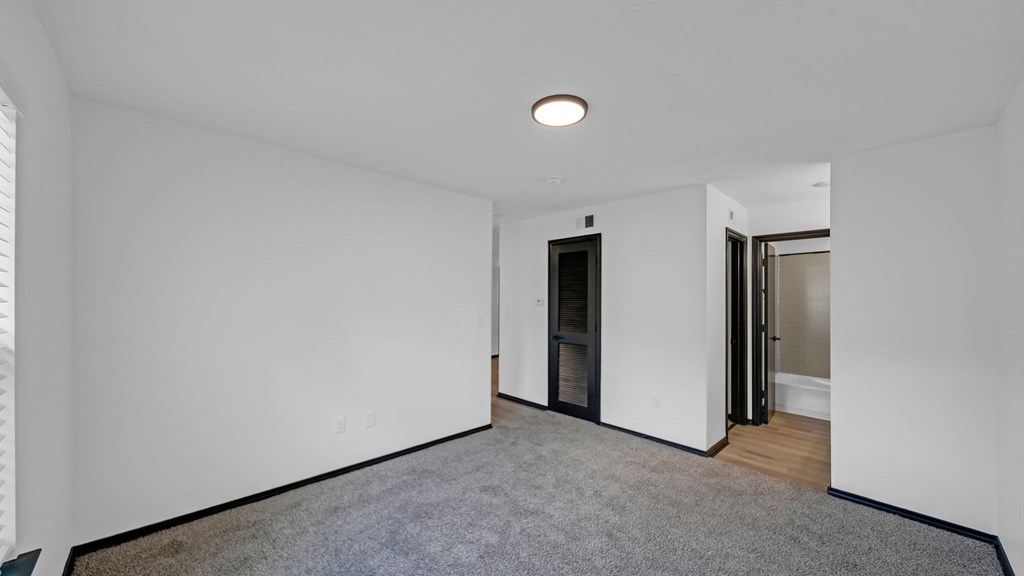 Carpeted Bedroom at The District Apartments, Memphis, TN