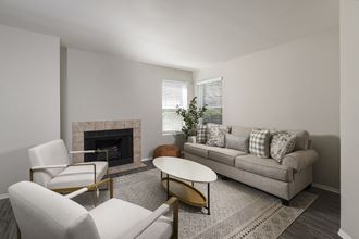 Modern living room with fireplace at The Nova, Memphis, TN - Photo Gallery 5