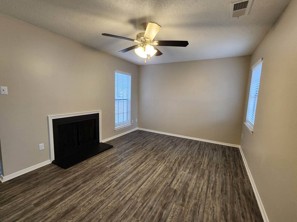 Living Room Space With a Fireplace at The Birches in TN