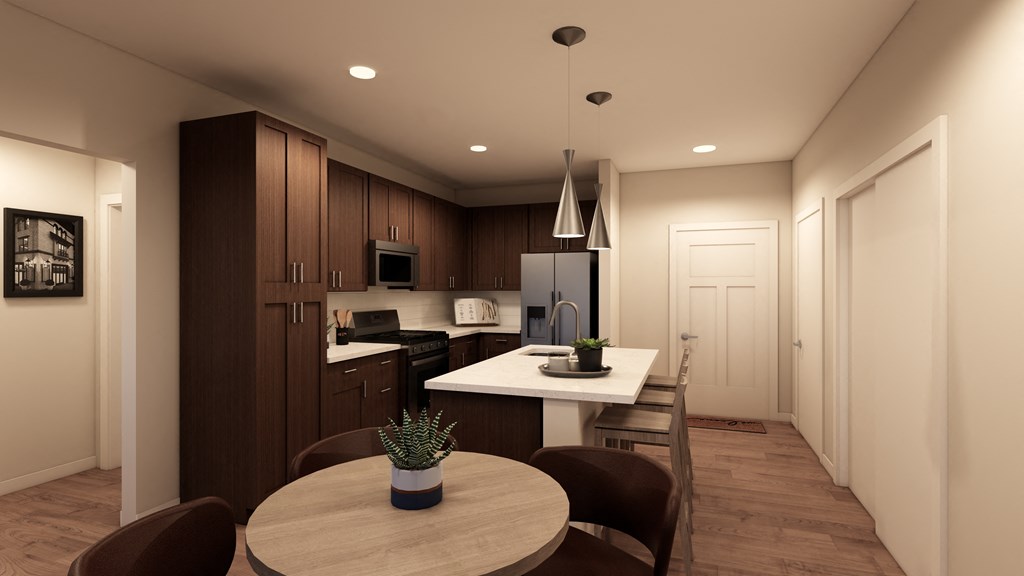 a kitchen and dining room with a table and chairs at The Virginia, Texas, 78155