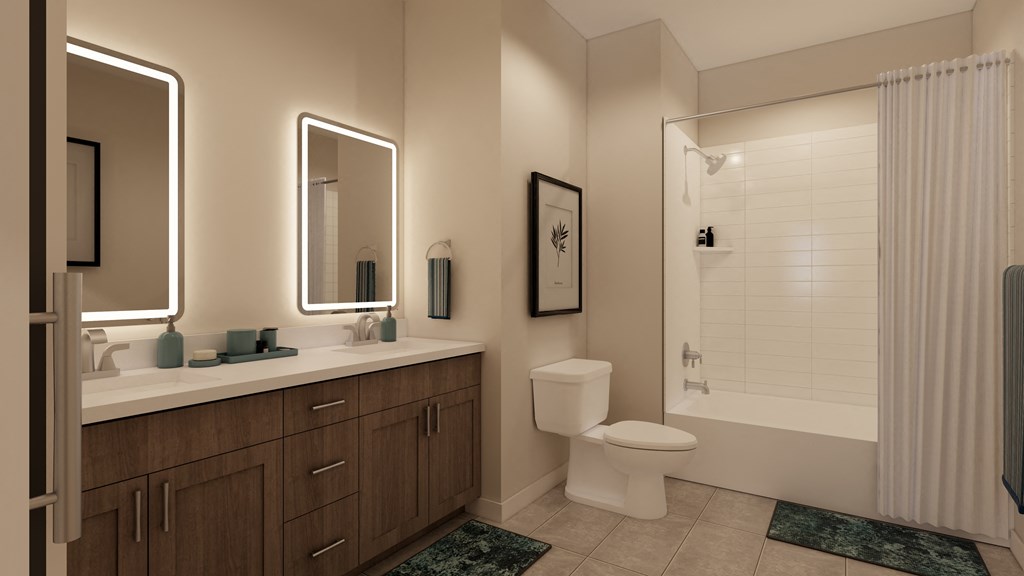 a bathroom with a toilet and a sink and a shower at The Virginia, Seguin, TX 78155