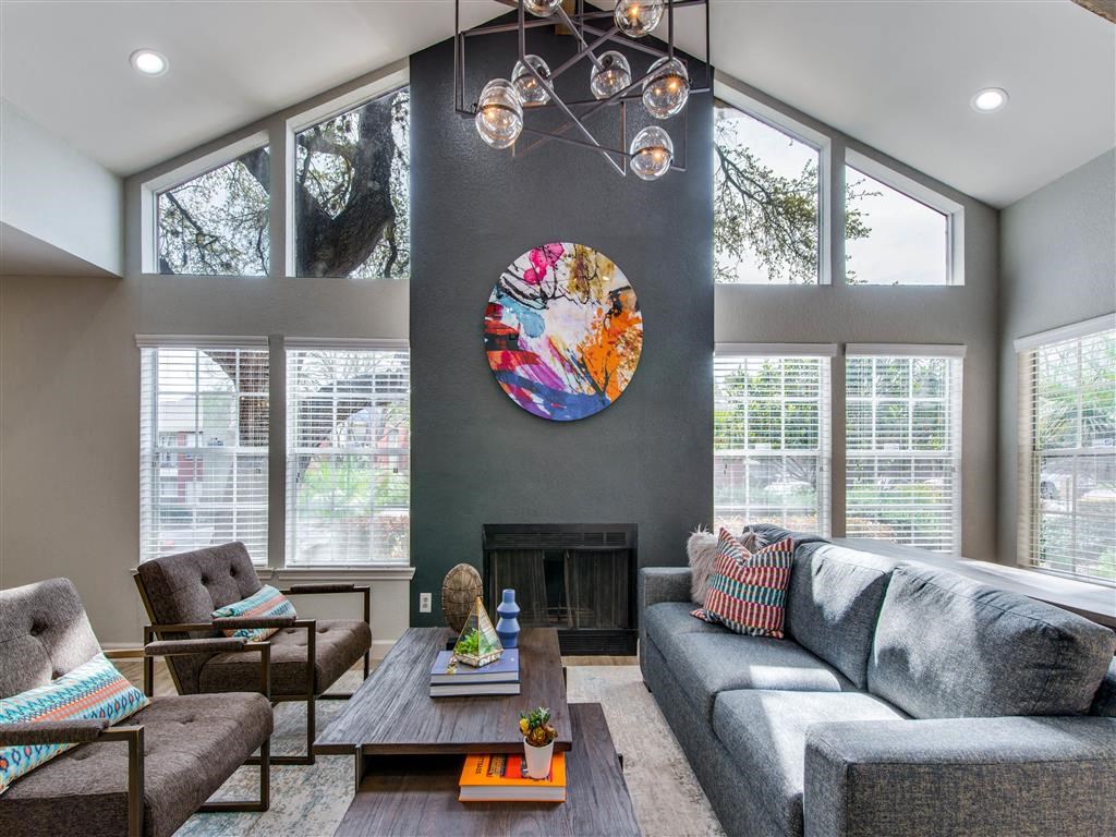 Distinguished Lounge Area With Fireplace at Wildwood Apartments, CLEAR Property Management, Texas, 78752