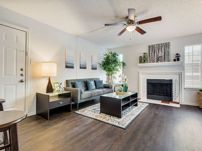 Living Room Remodel With Fireplace Sophisticated Living Room Remodel With Fireplace at Wildwood Apartments, CLEAR Property Management, Texas, 78752