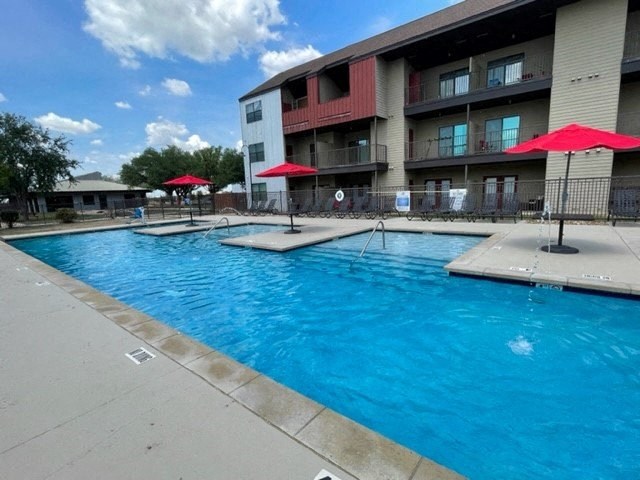 Sparkling Community Pool area  at Aviator at Brooks Apartments, San Antonio, 78235