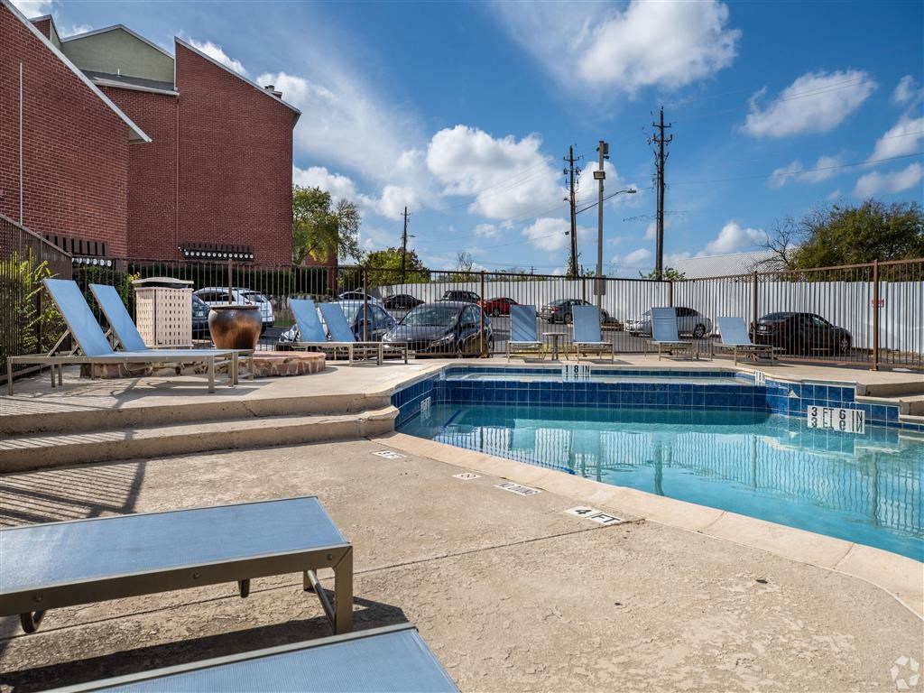 Pool Side Relaxing Area With Sundeck at Wildwood Apartments, CLEAR Property Management, Austin, TX, 78752
