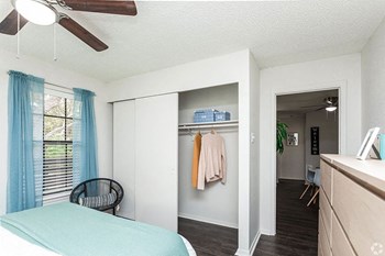 Bedroom With Closet Bedroom With Closet at Peppermill Apartments, CLEAR Property Management, Texas - Photo Gallery 4