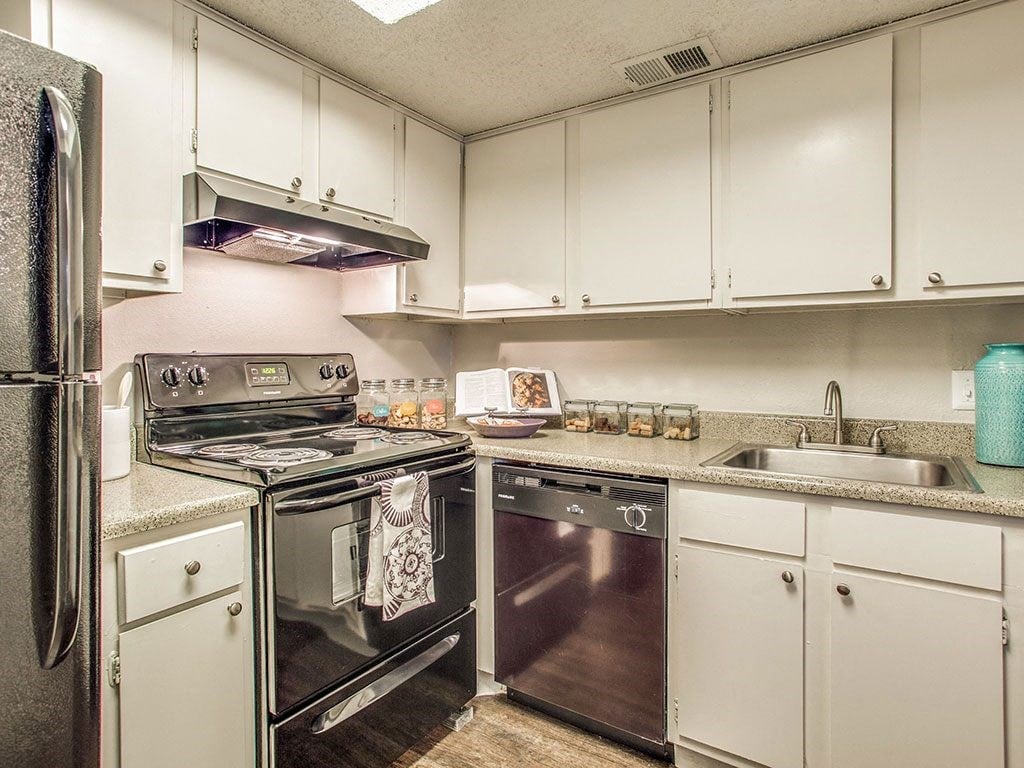Fully Furnished Kitchen With Stainless Steel Appliances at Newport Apartments, Irving, TX