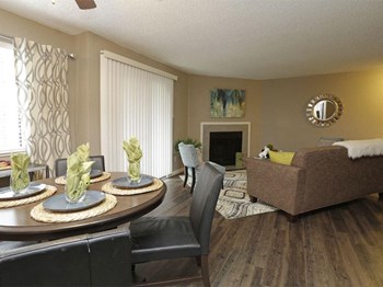 Elegant Dining Room & Living Room Elegant Dining Room & Living Room at Water Ridge Apartments, CLEAR Property Management, Texas - Photo Gallery 4