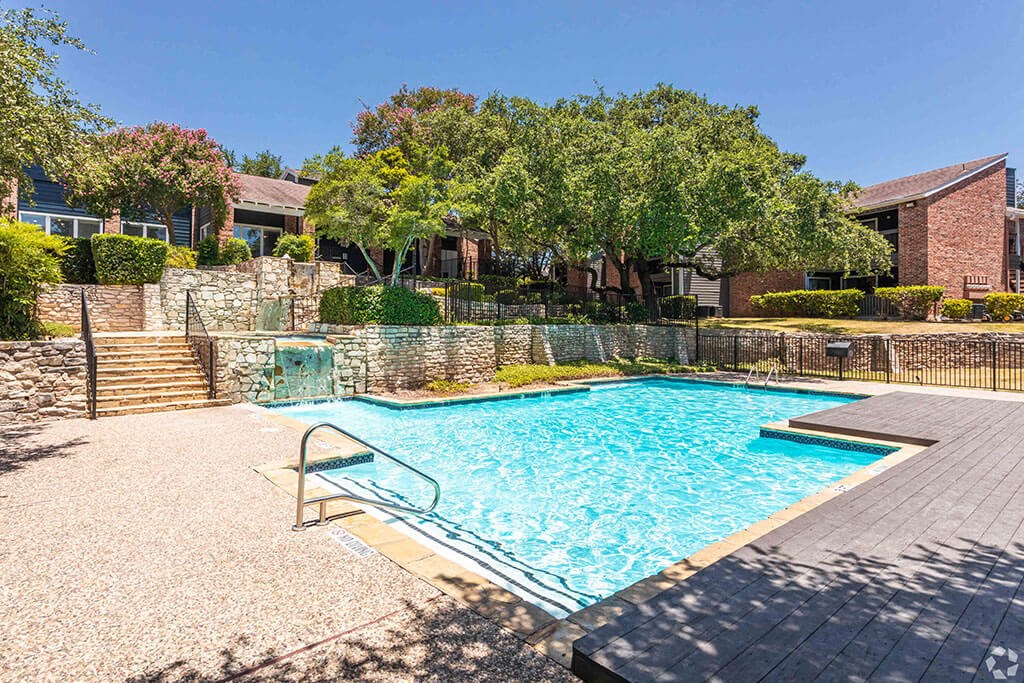 our apartments showcase a swimming pool  at Sunset Canyon, San Antonio, TX