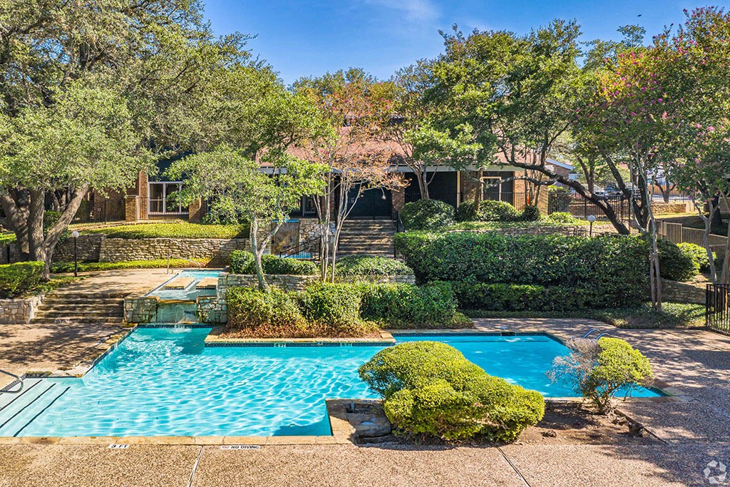 a house with a swimming pool in front of it  at Sunset Canyon, San Antonio, 78232