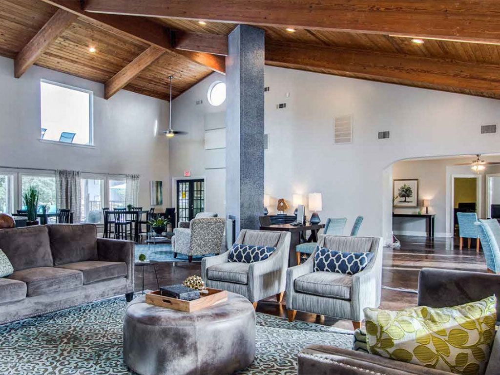 a large room with chairs and tables in it