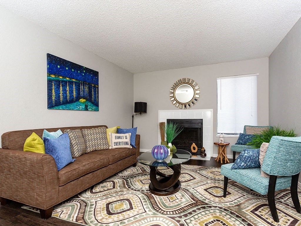 a living room with a couch and a chair