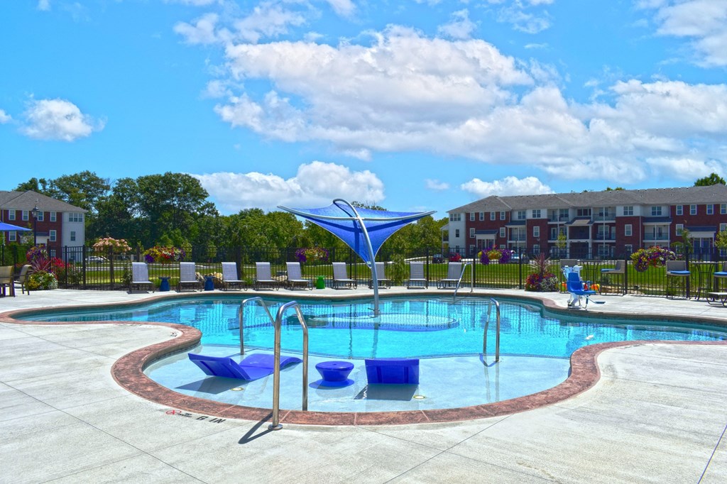 our apartments have a resort style pool with chaise lounge chairs